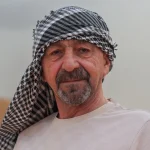 A senior citizen in dessert